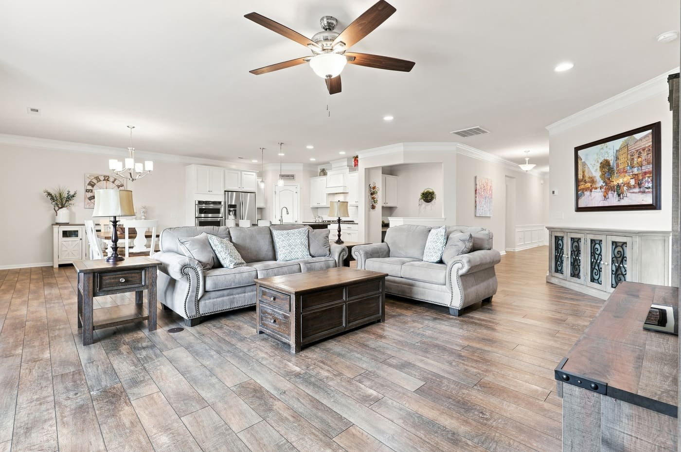 The family room looking toward the kitchen across the open plan.